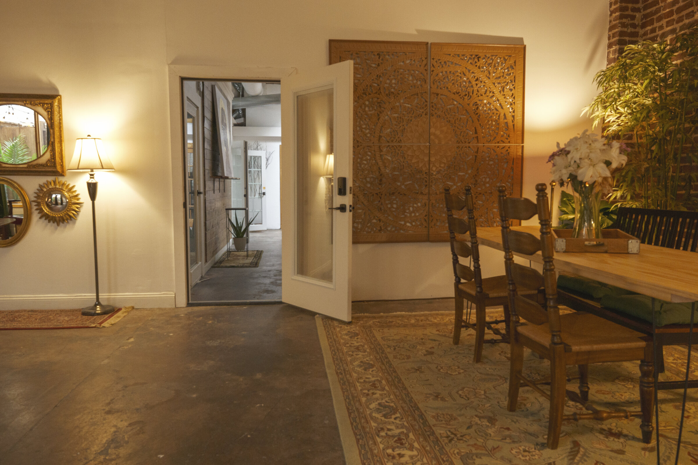 The long room — archway and dining table