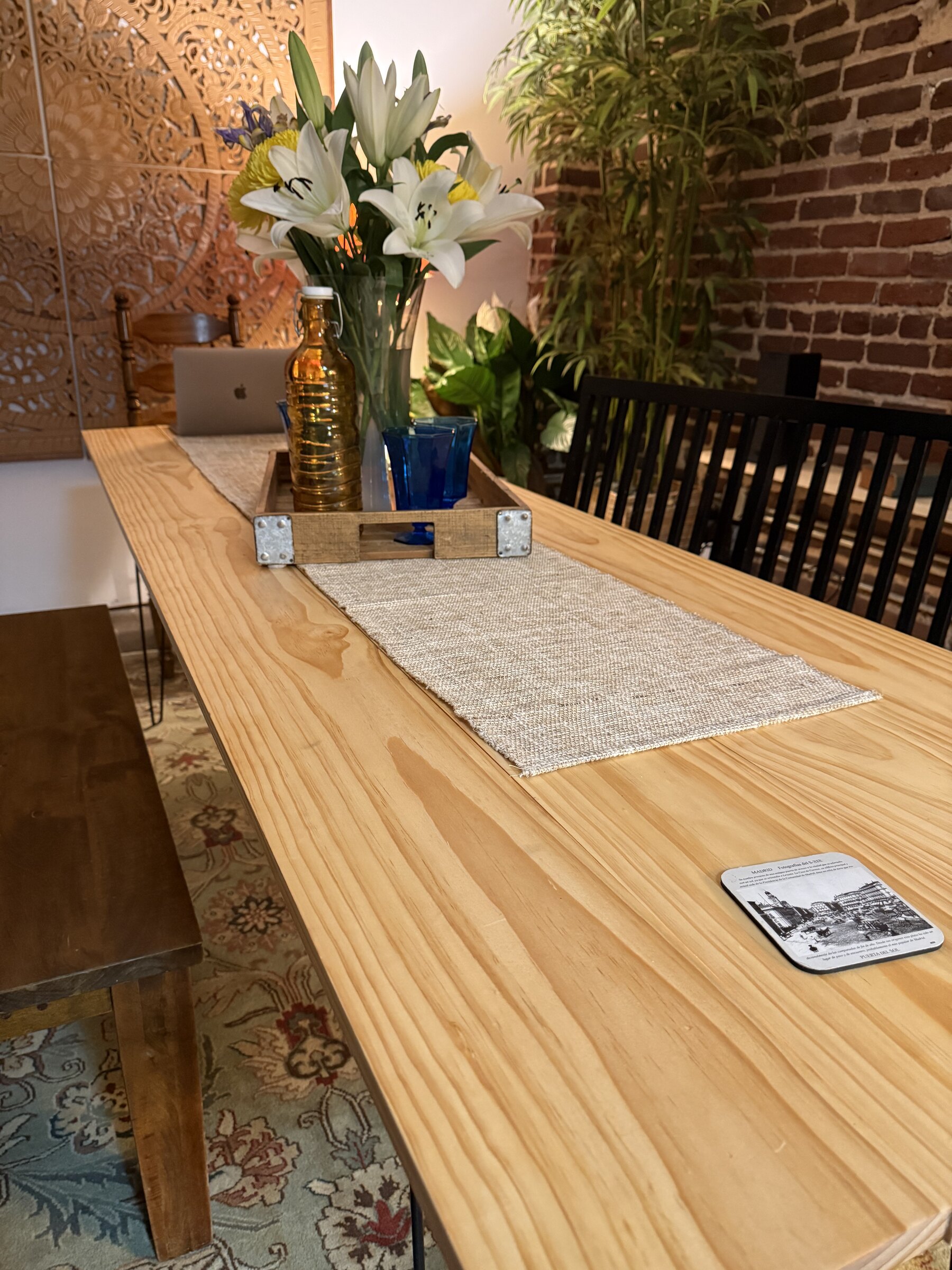 A close detail of the long table at Walker Street